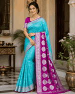 Aqua blue banarasi katan georgette saree with rich magenta border and blouse